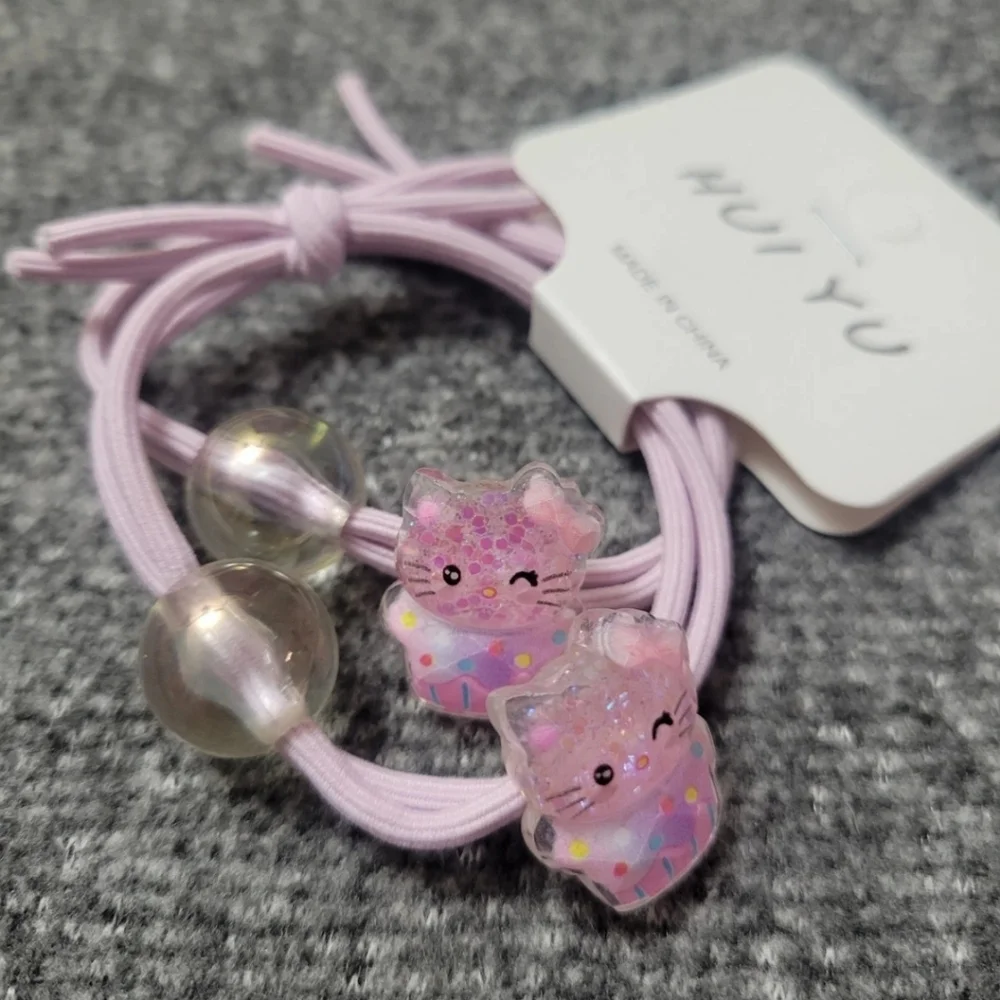 Hello Kitty Cupcake Hair Ties Set of 2 Sanrio Characters NWT Pink Purple Sparkle